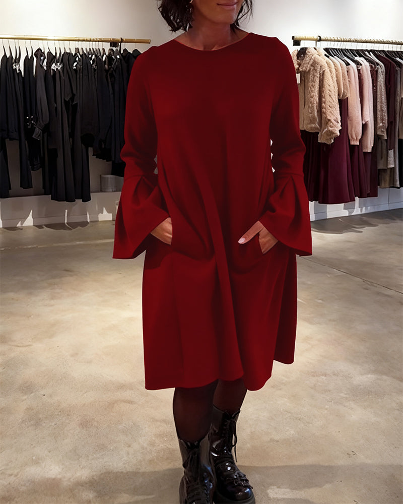 VESTIDO CON MANGAS ACAMPANADAS Y VOLANTES