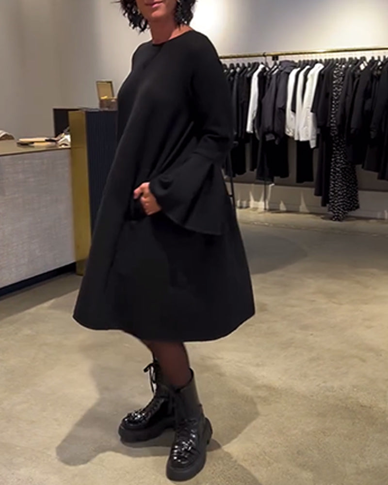 VESTIDO CON MANGAS ACAMPANADAS Y VOLANTES